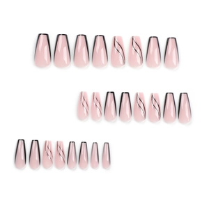 Faux ongles press-on french noir avec lignes pailletées argentées et fini rose nude