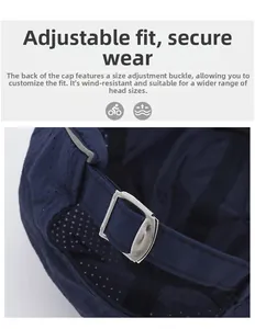 Detail of adjustable metal buckle and breathable mesh fabric on dark blue baseball cap