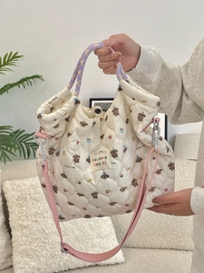 Quilted cream tote bag with bread dog print and purple checkered handles for women