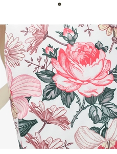 Close-up of floral canvas backpack detail with pink roses and fine twill texture
