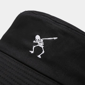 Punk style black bucket hat with white skeleton embroidery made of cotton twill fabric