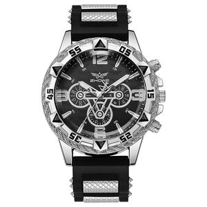 Montre chronographe homme avec boîtier argenté, bracelet silicone et cadran bleu