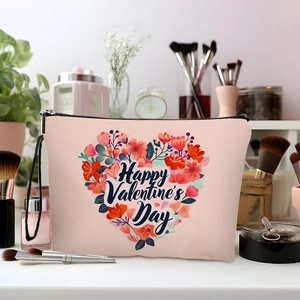 Pink canvas makeup bag with floral heart print and Happy Valentine's Day greeting