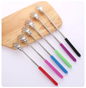 Extendable stainless steel back scratchers in six vibrant colors on a wooden surface