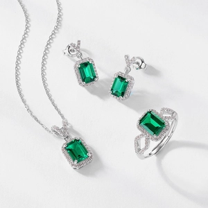 Luxurious S925 silver jewelry set featuring emerald-cut green gems and zircon accents