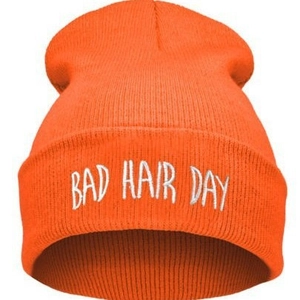 Orange Bad Hair Day beanie hat with white embroidery in a trendy hip-hop style