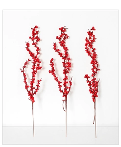 Close-up of three artificial red berry stems for Christmas tree and floral decoration