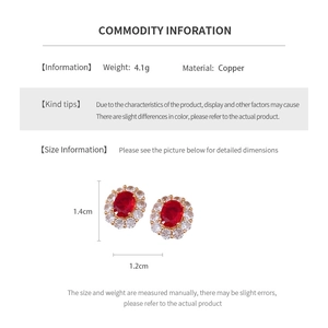 Detailed size view of 18K gold plated oval earrings with red gemstone and crystal halo