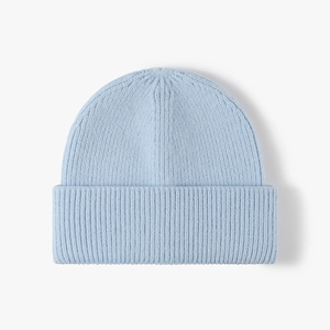Light blue ribbed knit beanie with wide double-folded cuff for winter warmth
