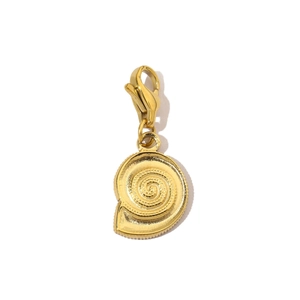 Detail of a golden spiral seashell pendant featuring a secure lobster clasp attachment