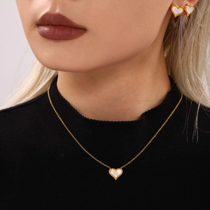 Golden stainless steel heart necklace and earrings set with white mother of pearl inlay