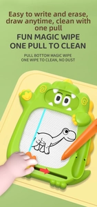 Detail of the magic wipe sliding handle on a green dinosaur magnetic drawing board for kids
