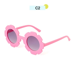 Pink flower-shaped sunflower sunglasses for kids with grey lenses for UV protection