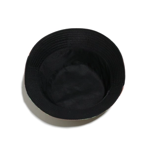 Detail view of the black cotton lining and durable fabric of this versatile burger bucket hat