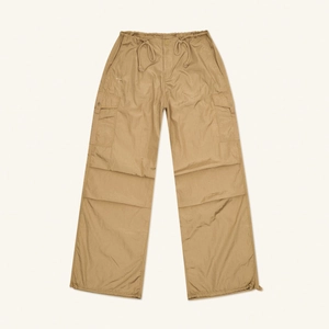 Khaki paratrooper cargo pants with wide leg and adjustable drawstrings for outdoors