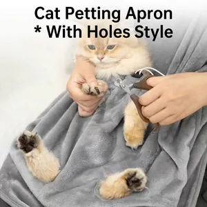 Grey flannel pet apron with leg holes for easy cat grooming and nail trimming