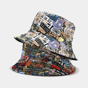 Graffiti print reversible sun hat with colorful astronaut patterns and black lining