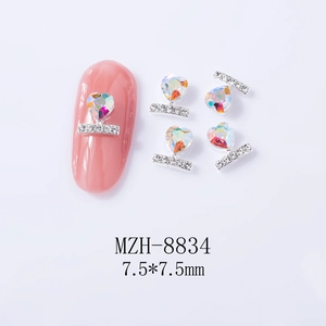 Macro shot of MZH-8834 heart-shaped nail charm with shimmering rhinestones 7.5mm