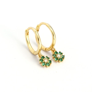 Elegant gold hoop earrings featuring green gemstone flower charms on white background