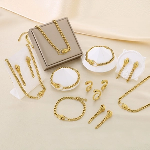 Parure de bijoux serpent vintage dorée avec yeux verts, colliers, bracelets et bagues