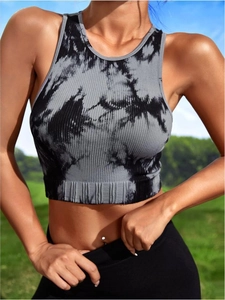 Detail of grey tie-dye seamless sports crop top featuring ribbed knit texture for yoga