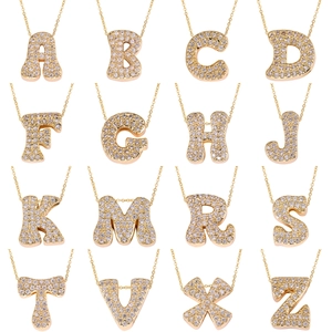 Detailed grid showing sixteen gold plated bubble letters with full cubic zirconia stones