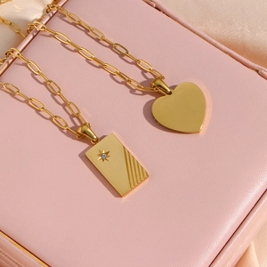 18K gold plated stainless steel necklaces with heart and rectangular starburst pendants