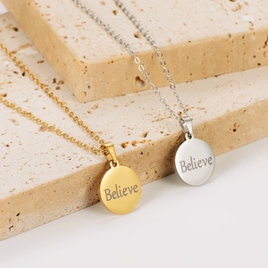 Minimalist 18k gold and silver stainless steel necklaces with circular Believe pendants