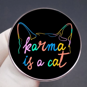 Karma is a cat metal badge with colorful text and cat ear design for music fans
