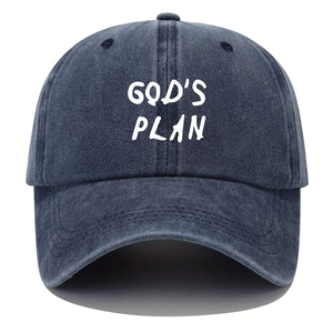 Detailed macro of God's Plan printed washed denim texture on a navy baseball cap