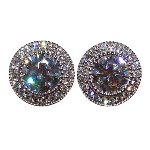 Elegant silver round halo stud earrings featuring sparkling brilliant-cut cubic zirconia