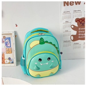 Detail view of green dinosaur toddler backpack featuring 3D hard shell and PU EVA material