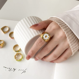Gold wide band rings with white daisy enamel pattern and colorful spring floral designs