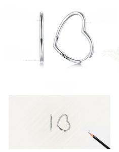 Detail of s925 silver heart earring with LOVE engraving and design inspiration sketch