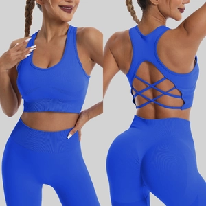 Ensemble de yoga bleu sans couture avec brassière à dos croisé et legging taille haute