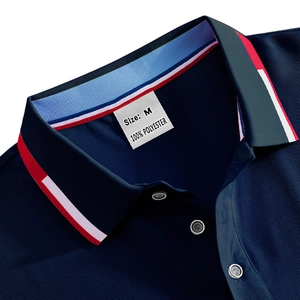 Close-up of navy blue polo shirt showing collar detail, buttons and M size label