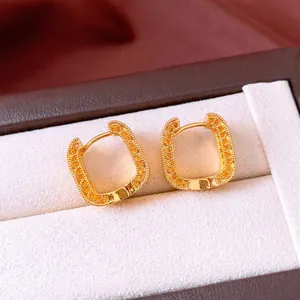 Vintage style square zircon earrings in 18K gold plating with textured patterns
