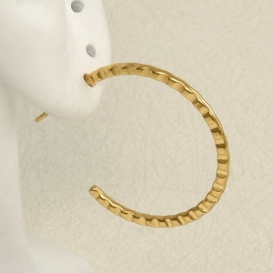 304 stainless steel gold hoop earrings with wave texture on model for minimalist style