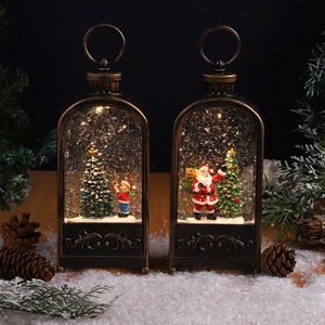 Detail of vintage bronze Christmas lanterns with festive LED scenes and swirling snow