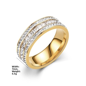 7mm wide gold ring with three rows of cubic zirconia stones, weighs 6.5g in total
