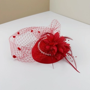 Elegant red vintage fascinator hat with veil, feathers and pearls for formal occasions