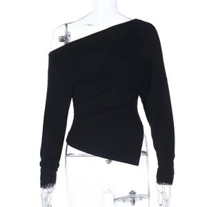 Detail view of black off-shoulder long sleeve top featuring asymmetric irregular neckline