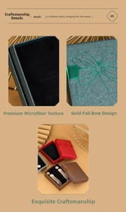 Detailed view of jewelry boxes with microfiber lining and gold bow knot design