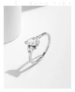Detail of S925 sterling silver ring showing pear-cut cubic zirconia and S925 hallmark