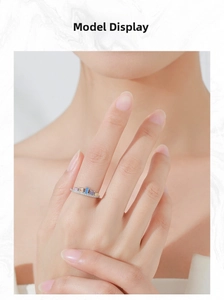 Close-up of S925 sterling silver crown ring with colorful zircon stones on model hand