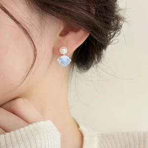 Elegant silver pin earrings featuring a white pearl and light blue shell pendant