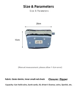 Detailed view of blue denim star pattern makeup pouch with exact size dimensions 20cmx13cm