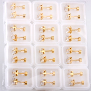 Set of 12 pairs of gold-plated cubic zirconia stud earrings in a classic four-claw setting