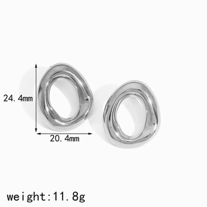Detailed view of silver irregular oval earrings with dimensions 24.4mm and weight 11.8g