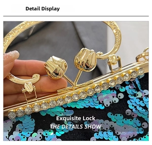 Detail of tulip-shaped golden clasp with rhinestones on a sequined shell evening bag